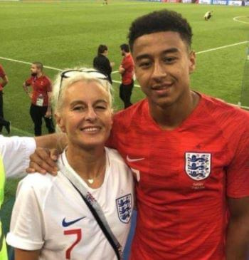 Louie Scott brother Jesse Lingard and mother celebrating for England win over Sweden.